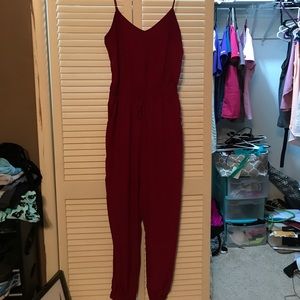 Maroon jumpsuit.